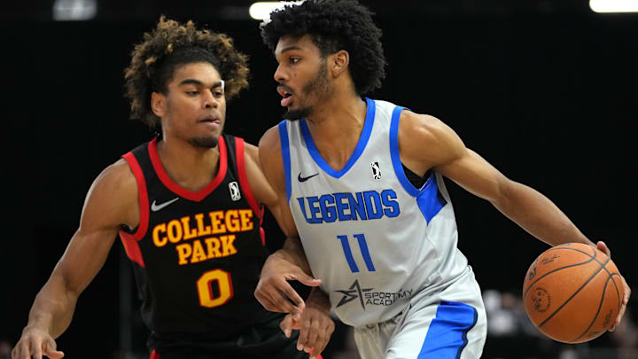 Dec 22, 2021; Las Vegas, NV, USA; Texas Legends forward Feron Hunt (11) dribbles against College Park Skyhawks guard Malik Ellison (0) during the first quarter at Mandalay Bay Convention Center. Mandatory Credit: Stephen R. Sylvanie-Imagn Images