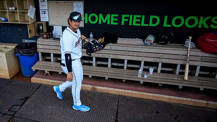 Akron infielder Ralphy Velazquez (24) is the first player into the dugout before the home opening-day game between the Akron RubberDucks and the Reading Fightin Phils, April 2, 2026, in Akron, Ohio.