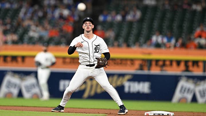 Jun 10, 2026; Detroit, Michigan, USA;  Detroit Tigers shortstop Zack Short (15) turns a double play against the Minnesota Twins in the seventh inning at Comerica Park. Mandatory Credit: Lon Horwedel-Imagn Images