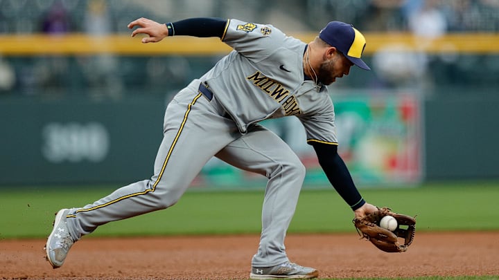 Apr 8, 2025; Denver, Colorado, USA; Milwaukee Brewers third baseman Vinny Capra (18) fields the ball in the first inning against the Colorado Rockies at Coors Field. Mandatory Credit: Isaiah J. Downing-Imagn Images Apr 8, 2025; Denver, Colorado, USA; Milwaukee Brewers third baseman Vinny Capra (18) fields the ball in the first inning against the Colorado Rockies at Coors Field. Mandatory Credit: Isaiah J. Downing-Imagn Images