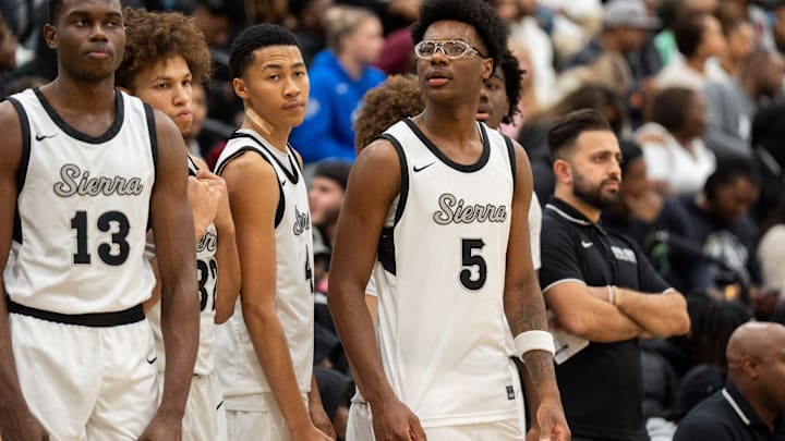 Sierra Canyon’s Bryce James (5), the son of NBA player LeBron James, stands with his teammates by the bench before the game between Sierra Canyon and Bartlett High School.