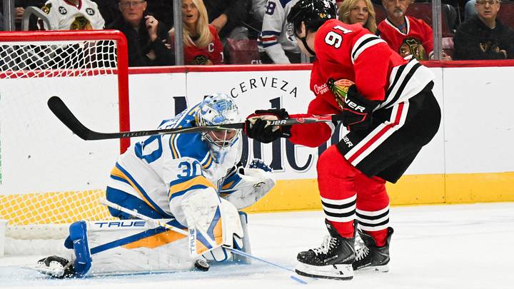 Oct 6, 2026; Chicago, Illinois, USA;  St. Louis Blues goaltender Joel Hofer (30) defends against Chicago Blackhawks center Frank Nazar (91)  during the first period at United Center.  Mandatory Credit: Matt Marton-Imagn Images