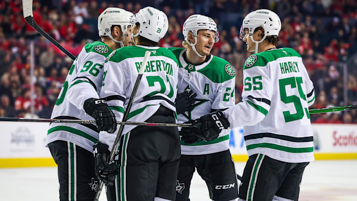 Mar 27, 2025; Calgary, Alberta, CAN; Dallas Stars center Roope Hintz (24) celebrates his goal with teammates against the Calgary Flames during the first period at Scotiabank Saddledome. Mandatory Credit: Sergei Belski-Imagn Images