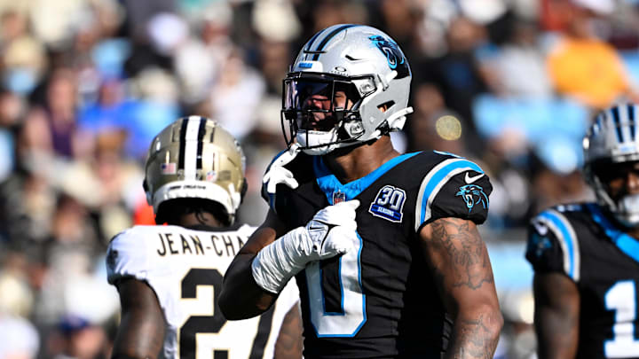 Nov 3, 2024; Charlotte, North Carolina, USA; Carolina Panthers tight end Ja'Tavion Sanders (0) reacts after making a catch in the third quarter at Bank of America Stadium. Mandatory Credit: Bob Donnan-Imagn Images
