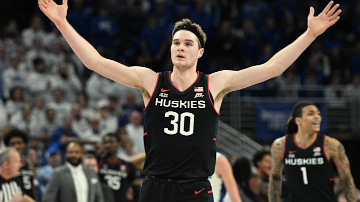 Feb 11, 2025; Omaha, Nebraska, USA; Connecticut Huskies forward Liam McNeeley (30) celebrates a basket against the Creighton Bluejays during the second half at CHI Health Center Omaha. Mandatory Credit: Steven Branscombe-Imagn Images Feb 11, 2025; Omaha, Nebraska, USA; Connecticut Huskies forward Liam McNeeley (30) celebrates a basket against the Creighton Bluejays during the second half at CHI Health Center Omaha. Mandatory Credit: Steven Branscombe-Imagn Images