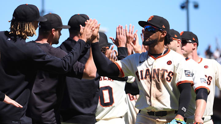 Jun 30, 2024; San Francisco, California, USA; San Francisco Giants left fielder Luis Matos (29) high fives starting pitcher Spencer Bivens (76) after the game against the Los Angeles Dodgers at Oracle Park. Jun 30, 2024; San Francisco, California, USA; San Francisco Giants left fielder Luis Matos (29) high fives starting pitcher Spencer Bivens (76) after the game against the Los Angeles Dodgers at Oracle Park.