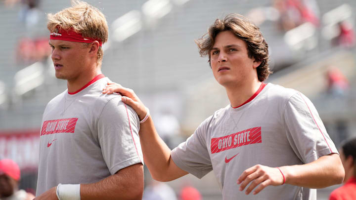 Aug 31, 2024; Columbus, OH, USA; Ohio State Buckeyes quarterback Julian Sayin (10) warms up with quarterback Lincoln Kienholz (3) prior to the NCAA football game against the Akron Zips at Ohio Stadium.