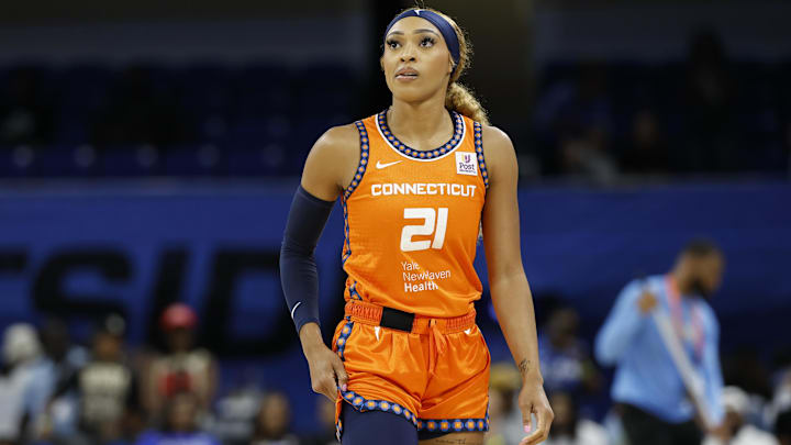 Connecticut Sun guard DiJonai Carrington (21) looks on during the first half of a basketball game against the Chicago Sky at Wintrust Arena. Connecticut Sun guard DiJonai Carrington (21) looks on during the first half of a basketball game against the Chicago Sky at Wintrust Arena.