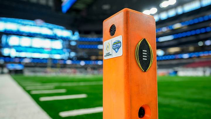 The goal pylon features logos of the College Football Playoff and Cotton Bowl inside AT&T Stadium in Arlington, Texas prior to the matchup between the Ohio State Buckeyes and the Miami Hurricanes in the CFP quarterfinal game on Dec. 31, 2025. The goal pylon features logos of the College Football Playoff and Cotton Bowl inside AT&T Stadium in Arlington, Texas prior to the matchup between the Ohio State Buckeyes and the Miami Hurricanes in the CFP quarterfinal game on Dec. 31, 2025.
