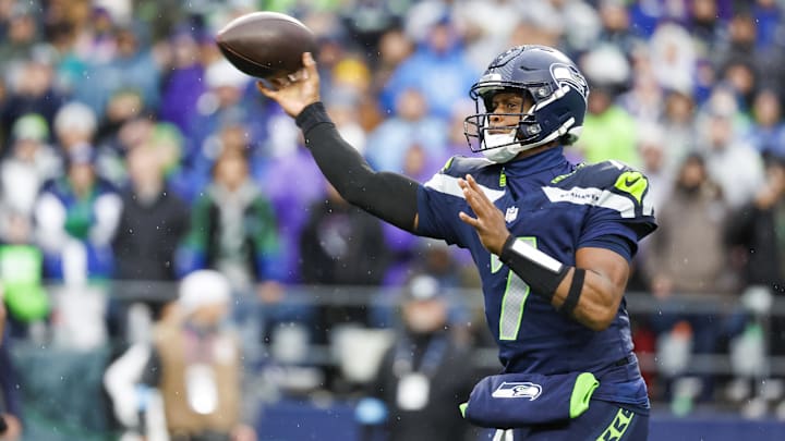 Dec 22, 2024; Seattle, Washington, USA; Seattle Seahawks quarterback Geno Smith (7) passes against the Minnesota Vikings during the second quarter at Lumen Field. Mandatory Credit: Joe Nicholson-Imagn Images Dec 22, 2024; Seattle, Washington, USA; Seattle Seahawks quarterback Geno Smith (7) passes against the Minnesota Vikings during the second quarter at Lumen Field. Mandatory Credit: Joe Nicholson-Imagn Images