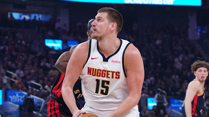 Apr 4, 2025; San Francisco, California, USA; Denver Nuggets center Nikola Jokic (15) drives to the basket past Golden State Warriors forward Jimmy Butler III (10) in the first period at Chase Center. Mandatory Credit: David Gonzales-Imagn Images Apr 4, 2025; San Francisco, California, USA; Denver Nuggets center Nikola Jokic (15) drives to the basket past Golden State Warriors forward Jimmy Butler III (10) in the first period at Chase Center. Mandatory Credit: David Gonzales-Imagn Images