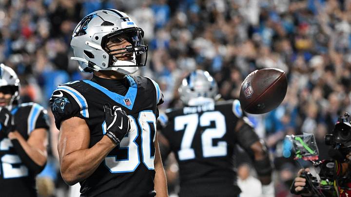 Jan 10, 2026; Charlotte, NC, USA; Carolina Panthers running back Chuba Hubbard (30) reacts after scoring a touchdown in the fourth quarter in an NFC Wild Card Round game at Bank of America Stadium. Mandatory Credit: Bob Donnan-Imagn Images