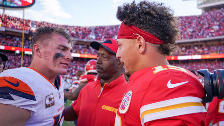Nov 10, 2024; Kansas City, Missouri, USA; Kansas City Chiefs quarterback Patrick Mahomes (15) greets Denver Broncos quarterback Bo Nix (10) after the game at GEHA Field at Arrowhead Stadium. 