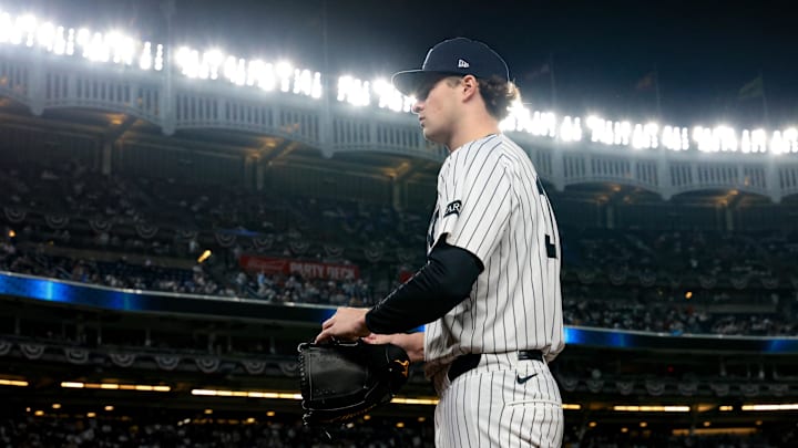 Oct 2, 2025; Bronx, New York, USA; New York Yankees starting pitcher Cam Schlittler (31) walks in from the bullpen prior to game three of the Wildcard round for the 2025 MLB playoffs against the Boston Red Sox at Yankee Stadium. Mandatory Credit: Vincent Carchietta-Imagn Images