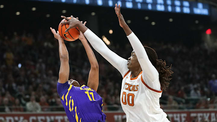 Feb 5, 2026; Austin, Texas, USA;  Texas Longhorns center Kyla Oldacre (00) blocks LSU Tigers guard ZaKiyah Johnson (4) during the first half at Moody Center. Mandatory Credit: Dustin Safranek-Imagn Images