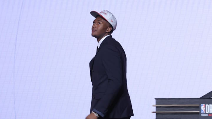 Jun 25, 2025; Brooklyn, NY, USA;  Derik Queen reacts on stage after being selected as the 13th pick by the Atlanta Hawks in the first round of the 2025 NBA Draft at Barclays Center. Mandatory Credit: Brad Penner-Imagn Images