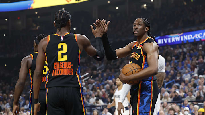Nov 17, 2024; Oklahoma City, Oklahoma, USA; Oklahoma City Thunder guard Shai Gilgeous-Alexander (2) and forward Jalen Williams (8) high five after a play against the Dallas Mavericks during the first quarter at Paycom Center. Mandatory Credit: Alonzo Adams-Imagn Images