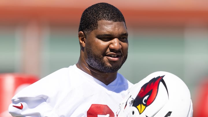 Jun 10, 2025; Tempe, AZ, USA; Arizona Cardinals defensive lineman Calais Campbell (93) holds his helmet during minicamp at the teams Arizona Cardinals Training Facility. Mandatory Credit: Mark J. Rebilas-Imagn Images