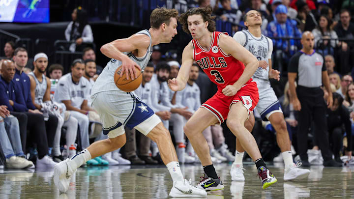 Nov 27, 2024; Orlando, Florida, USA; Chicago Bulls guard Josh Giddey (3) defends Orlando Magic forward Franz Wagner (22)