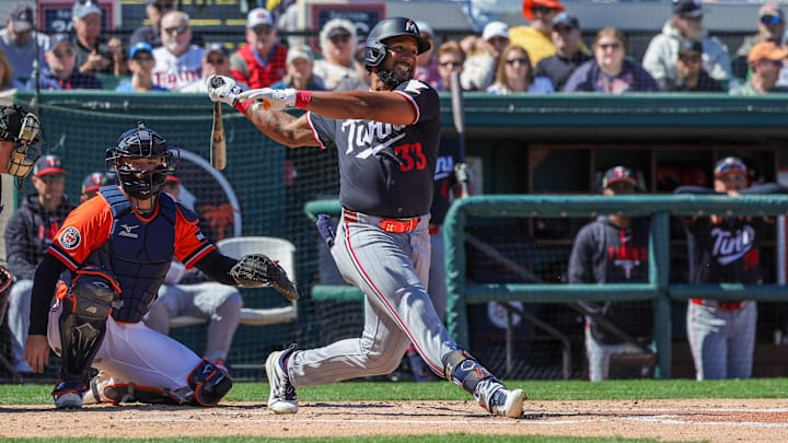 Feb 23, 2026; Lakeland, Florida, USA; Minnesota Twins center fielder Emmanuel Rodriguez (33) bats during the second inning against the Detroit Tigers at Publix Field at Joker Marchant Stadium.