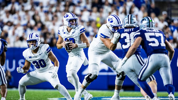 BYU QB Jake Retzlaff drops back against Kansas State