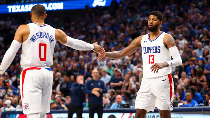 George and Russell Westbrook during a Clippers playoff game.
