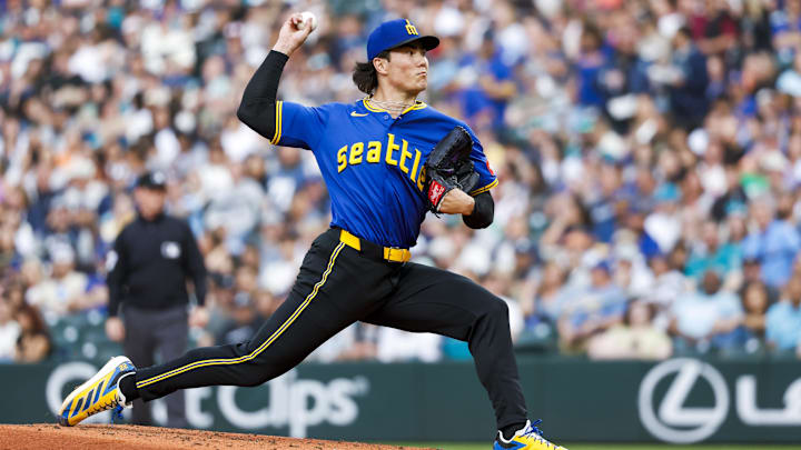 Seattle Mariners pitcher Bryan Woo throws during a game against the Minnesota Twins on May 30 at T-Mobile Park. Seattle Mariners pitcher Bryan Woo throws during a game against the Minnesota Twins on May 30 at T-Mobile Park.