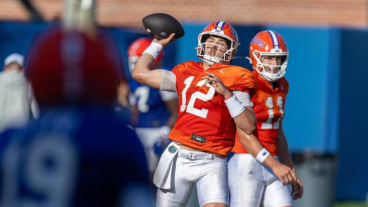 Florida quarterback Aaron Philo (12) and Florida quarterback Will Griffin (11) practice during Florida Football Fall camp practice availability at Heavener Football Training Center in Gainesville, FL on Friday, August 7, 2026. [Alan Youngblood/Gainesville Sun]