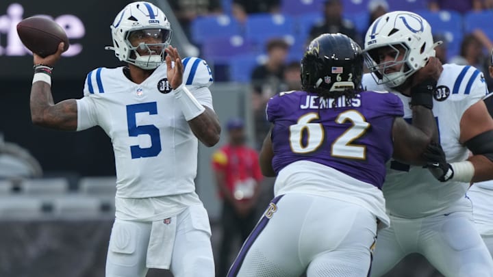 Aug 7, 2025; Baltimore, Maryland, USA; Indianapolis Colts quarterback Anthony Richardson Sr. (5) looks to pass during the first quarter pressured by Baltimore Ravens nose tackle John Jenkins (62) at M&T Bank Stadium. Mandatory Credit: Mitch Stringer-Imagn Images