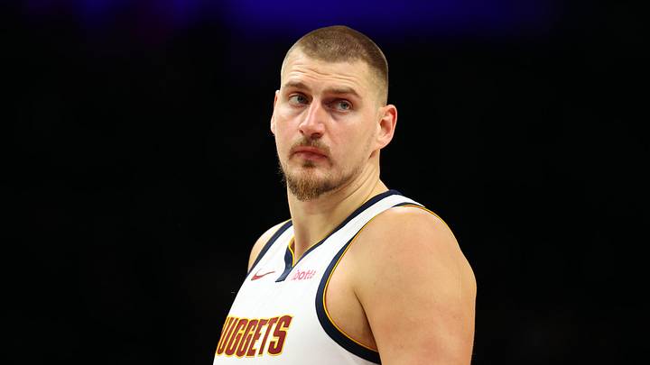 Nov 29, 2025; Phoenix, Arizona, USA; Denver Nuggets center Nikola Jokic (15) against the Phoenix Suns at the Mortgage Matchup Center.