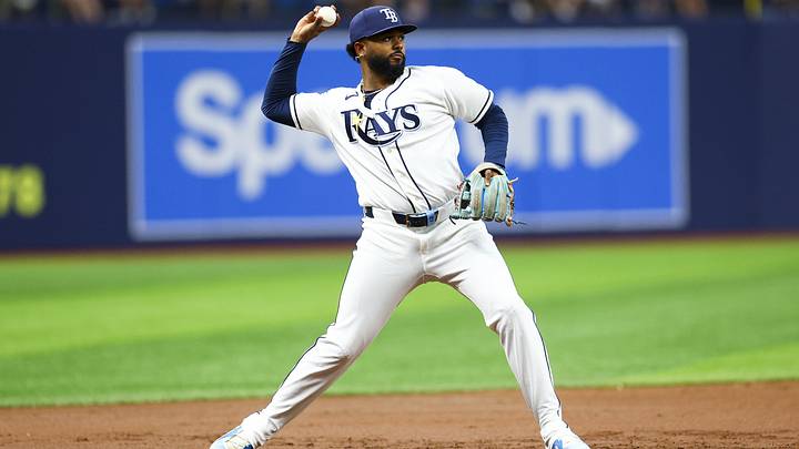 Jun 22, 2026; St. Petersburg, Florida, USA; Tampa Bay Rays third baseman Junior Caminero (13) throws to first for an out against the Kansas City Royals in the third inning at Tropicana Field.