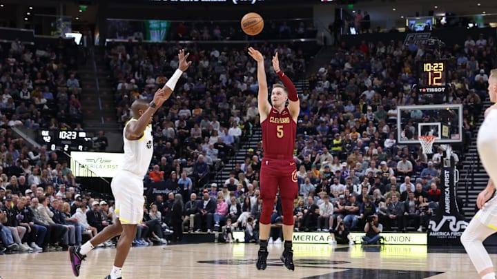 Apr 2, 2024; Salt Lake City, Utah, USA; Cleveland Cavaliers guard Sam Merrill (5) shoots a three