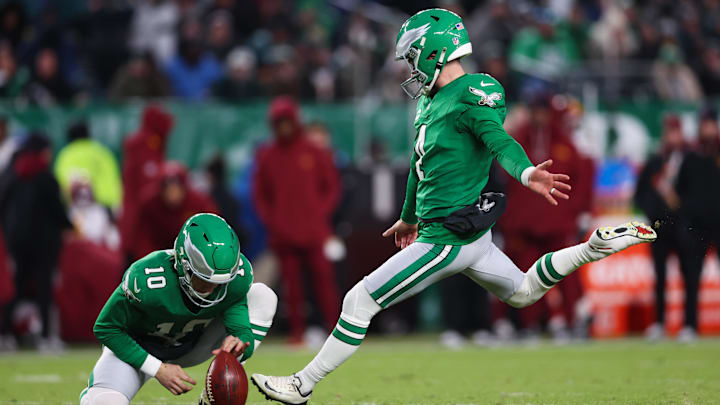 Jan 4, 2026; Philadelphia, Pennsylvania, USA;  Philadelphia Eagles place kicker Jake Elliott (4) kicks a point after try during the second quarter against the Washington Commanders at Lincoln Financial Field. Mandatory Credit: Bill Streicher-Imagn Images