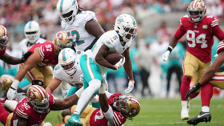 Miami Dolphins running back Jaylen Wright (5) is tackled by San Francisco 49ers defensive tackle Osa Odighizuwa (92) during the first half at Levi's Stadium. Miami Dolphins running back Jaylen Wright (5) is tackled by San Francisco 49ers defensive tackle Osa Odighizuwa (92) during the first half at Levi's Stadium.