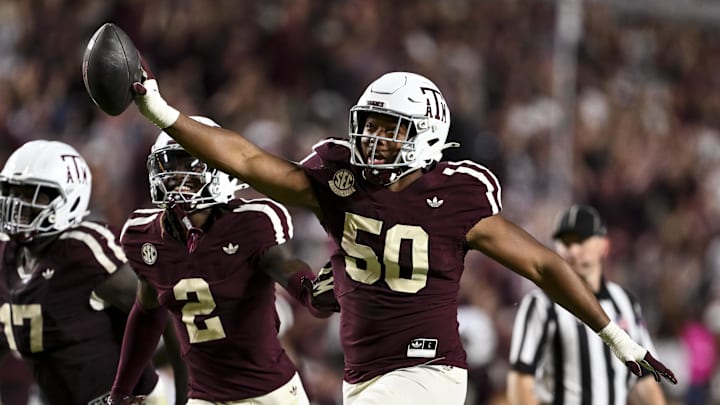Oct 11, 2025; College Station, Texas, USA; Texas A&M Aggies defensive end Dayon Hayes (50) reacts after recovering a fumble in the fourth quarter against the Florida Gators at Kyle Field. Mandatory Credit: Maria Lysaker-Imagn Images 
