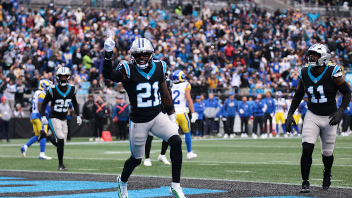 Carolina Panthers safety Nick Scott (21) celebrates after Carolina Panthers cornerback Mike Jackson Carolina Panthers safety Nick Scott (21) celebrates after Carolina Panthers cornerback Mike Jackson
