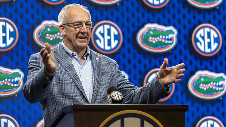 Oct 15, 2025; Birmingham, AL, USA; SEC commissioner Greg Sankey introduces Florida Gators head coach Todd Golden during SEC Media Days at Grand Bohemian Hotel. Mandatory Credit: Vasha Hunt-Imagn Images Oct 15, 2025; Birmingham, AL, USA; SEC commissioner Greg Sankey introduces Florida Gators head coach Todd Golden during SEC Media Days at Grand Bohemian Hotel. Mandatory Credit: Vasha Hunt-Imagn Images