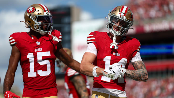 Nov 10, 2024; Tampa, Florida, USA; San Francisco 49ers wide receiver Ricky Pearsall (14) celebrates with wide receiver Jauan Jennings (15) after scoring a touchdown against the Tampa Bay Buccaneers in the first quarter at Raymond James Stadium. Mandatory Credit: Nathan Ray Seebeck-Imagn Images