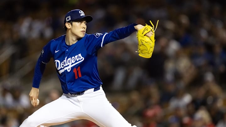 Los Angeles Dodgers pitcher Roki Sasaki against the Cincinnati Reds during a spring training game at Camelback Ranch-Glendale. 