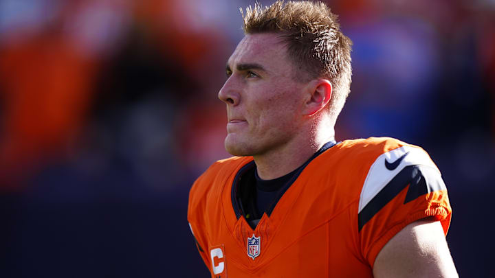 Denver Broncos quarterback Bo Nix (10) warms up before a game against the Green Bay Packers at Empower Field at Mile High.
