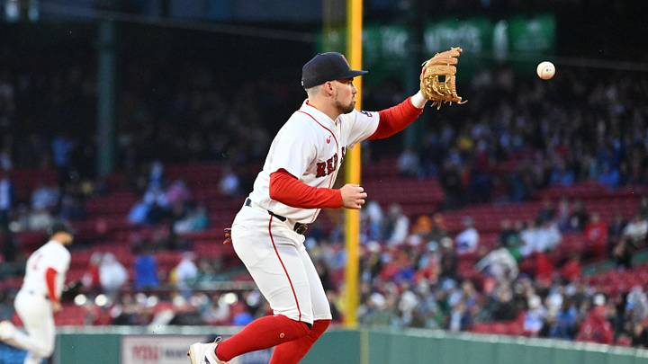 May 14, 2026; Boston, Massachusetts, USA; Boston Red Sox third baseman Caleb Durbin (5) makes a catch for an out against the Philadelphia Phillies during the third inning  at Fenway Park. Mandatory Credit: Eric Canha-Imagn Images