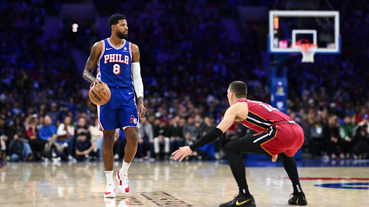 Feb 5, 2025; Philadelphia, Pennsylvania, USA; Philadelphia 76ers forward Paul George (8) controls the ball against the Miami Heat in the third quarter at Wells Fargo Center. Mandatory Credit: Kyle Ross-Imagn Images