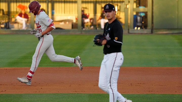 Arizona State University pitcher Khristian Curtis (5) reacts after giving up a home run to Jake Sapien (39) of Stanford at Phoenix Municipal Stadium.