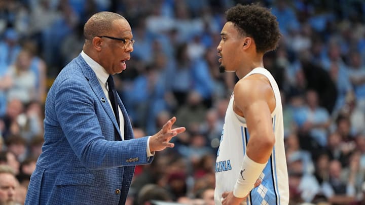 Feb 28, 2026; Chapel Hill, North Carolina, USA; North Carolina Tar Heels head coach Hubert Davis with guard Seth Trimble (7) in the second half at Dean E. Smith Center. Mandatory Credit: Bob Donnan-Imagn Images