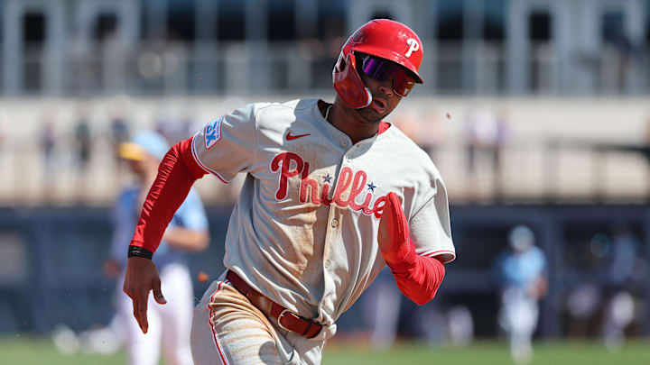 Philadelphia Phillies outfielder Justin Crawford (80) runs home to score against the Tampa Bay Rays during the fourth inning at Charlotte Sports Park. 