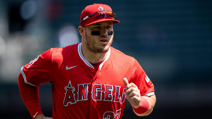 Apr 30, 2025; Seattle, Washington, USA;  Los Angeles Angels right fielder Mike Trout (27) jogs off the field before a game against the Seattle Mariners at T-Mobile Park. Mandatory Credit: Stephen Brashear-Imagn Images
