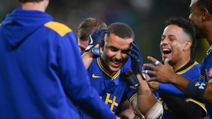 Sep 11, 2025; Seattle, Washington, USA; Seattle Mariners catcher Harry Ford (5) celebrates after the Mariners defeated the Los Angeles Angels at T-Mobile Park. Mandatory Credit: Steven Bisig-Imagn Images