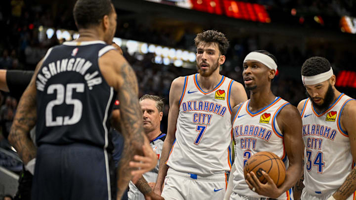 May 13, 2024; Dallas, Texas, USA; Dallas Mavericks forward P.J. Washington (25) yells at Oklahoma City Thunder forward Chet Holmgren (7) and guard Shai Gilgeous-Alexander (2) and forward Kenrich Williams (34) during the second half in game four of the second round for the 2024 NBA playoffs at American Airlines Center. Mandatory Credit: Jerome Miron-Imagn Images