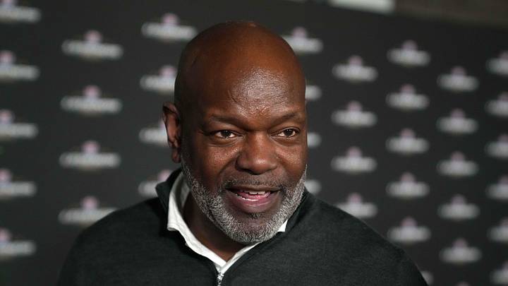 Emmitt Smith poses on the red carpet during the NFL Alumni Legends Party.