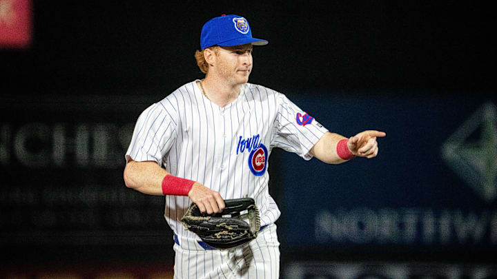 Iowa Cubs' Owen Caissie (17) makes his way to the dugout at Principal Park in Des Moines.